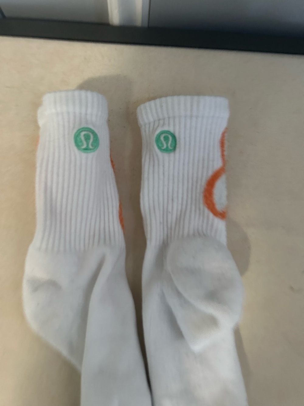 LULULEMON socks with logo and flower design!!!